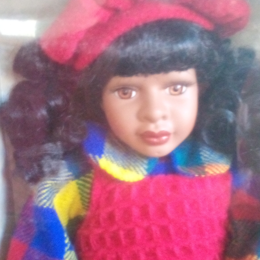 Black Genuine fine this porcelain doll